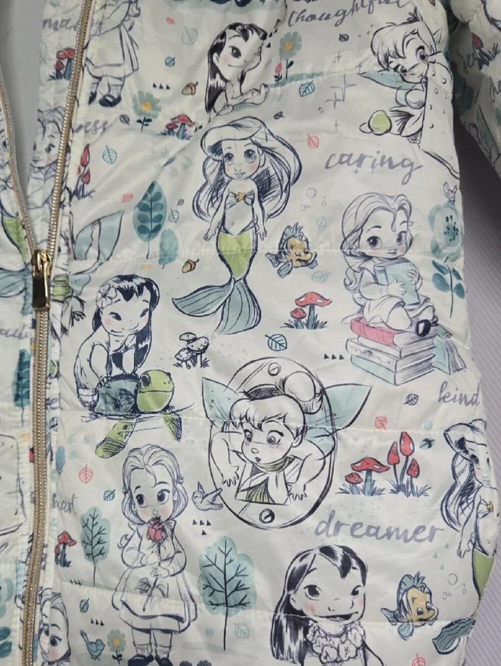Disney Quilted Puffer Jacket with Cream Background and Pastel Accents